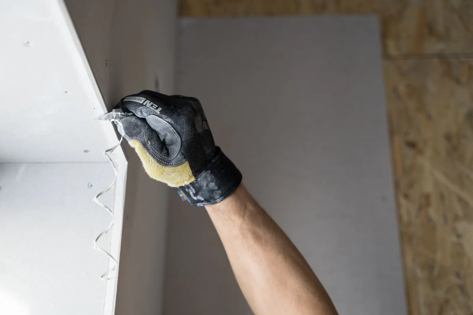 Drywall being patched and repaired